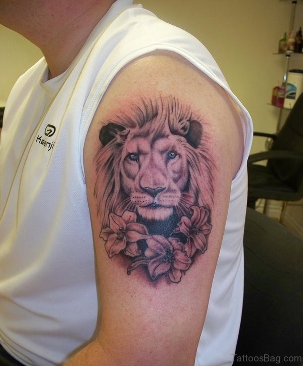 Brown Lion Tattoo On Arm