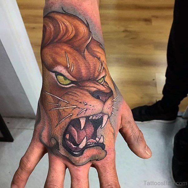 Brown Roaring Lion Tattoo On Hand