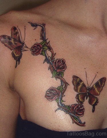 Butterfly And Rose Vines Tattoo On Chest 