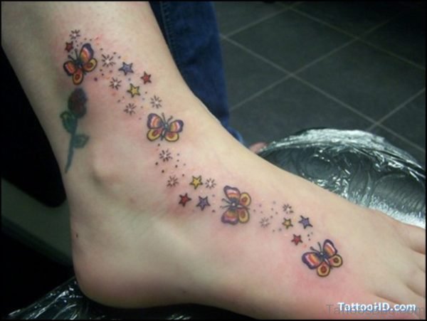 Butterfly And Stars Tattoo On Foot