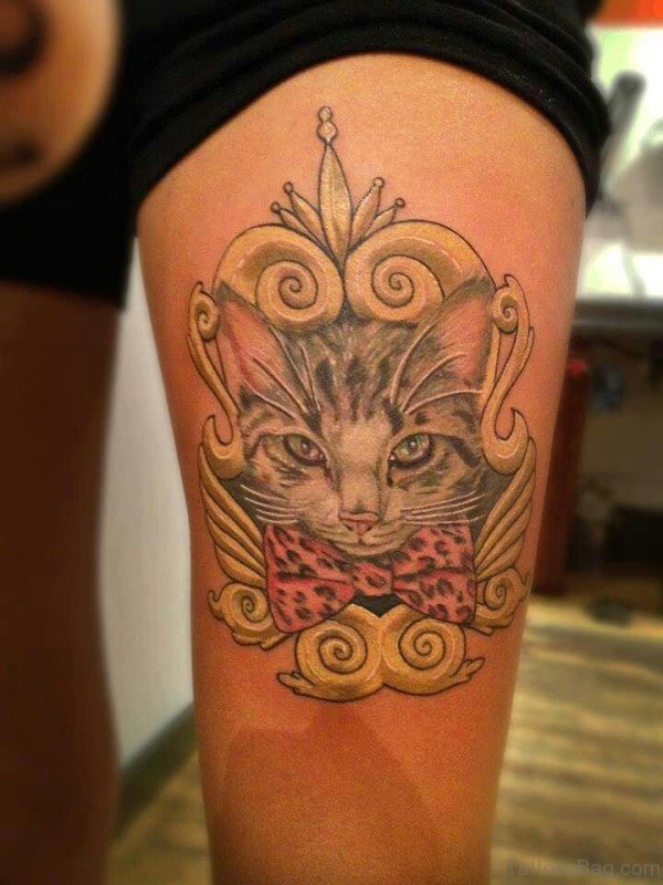 Cat With Bow Tattoo On Thigh
