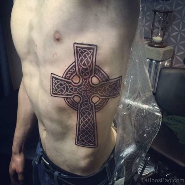 Celtic Cross Tattoo On Rib