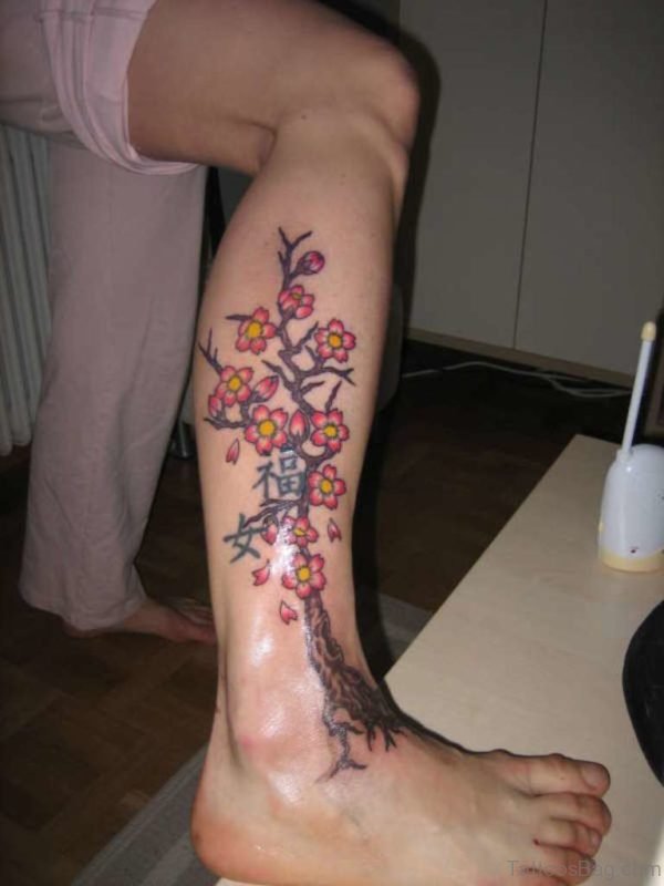 Cherry Blossom Flower Tree With Twin Chinese Characters Tattoo On Leg