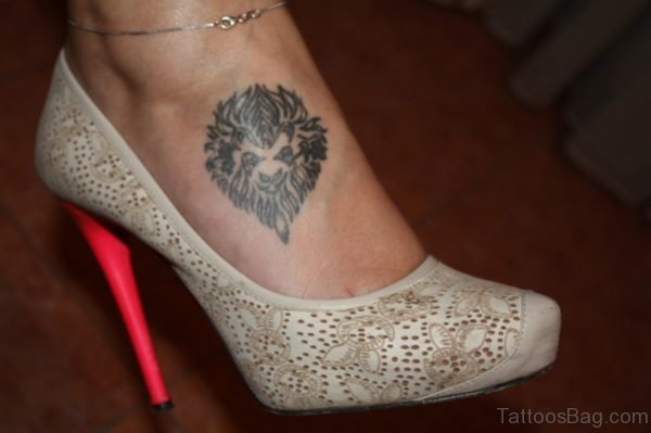 Classy Lion Head Tattoo On Foot