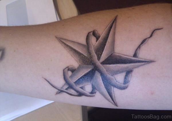 Classy Star Tattoo On Arm