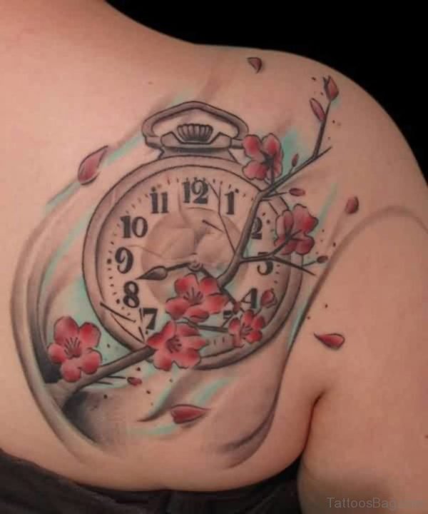 Clock And Flowers Tattoo On Back