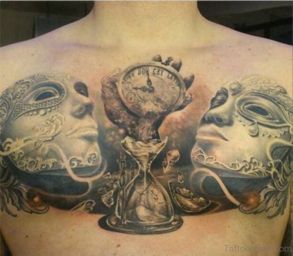 Clock Sandclock And Mask Tattoos On Chest