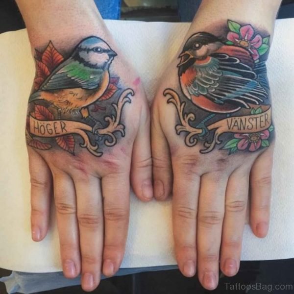 Colored Bird Tattoo On Hand