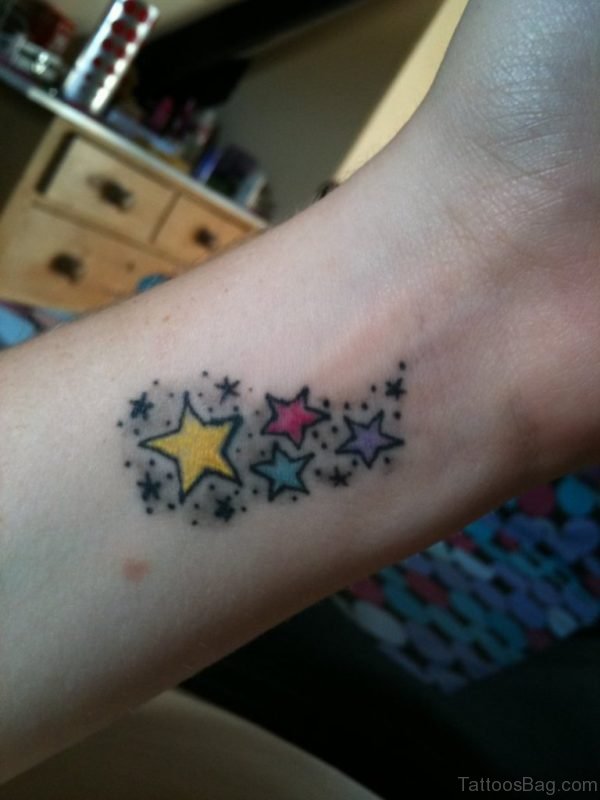 Colored Stars Tattoo On Wrist 