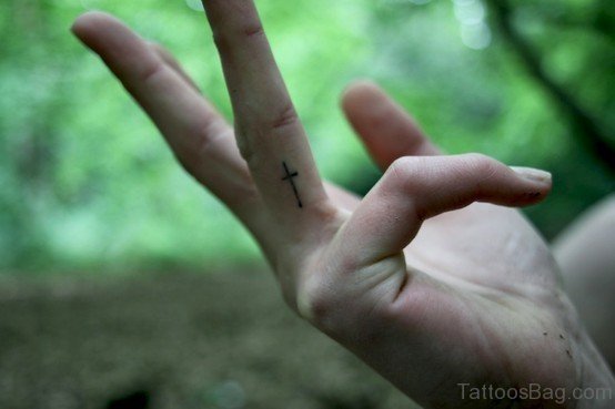 Cross Tattoo On Finger 