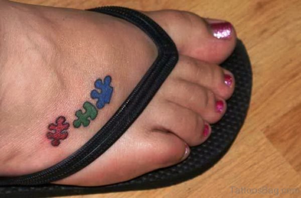 Cute Autism Tattoo On Foot