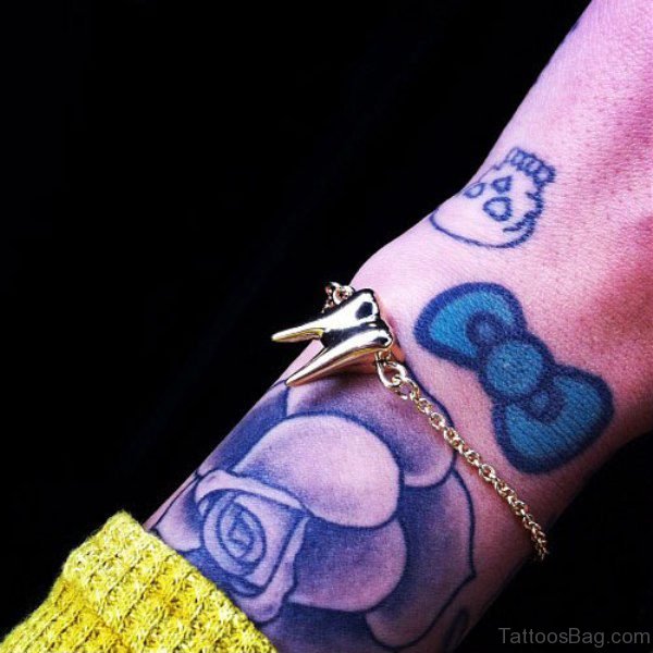 Cute Blue Rose Wrist Tattoo