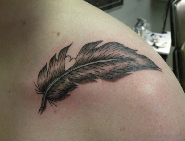 Cute Grey Feather Tattoo