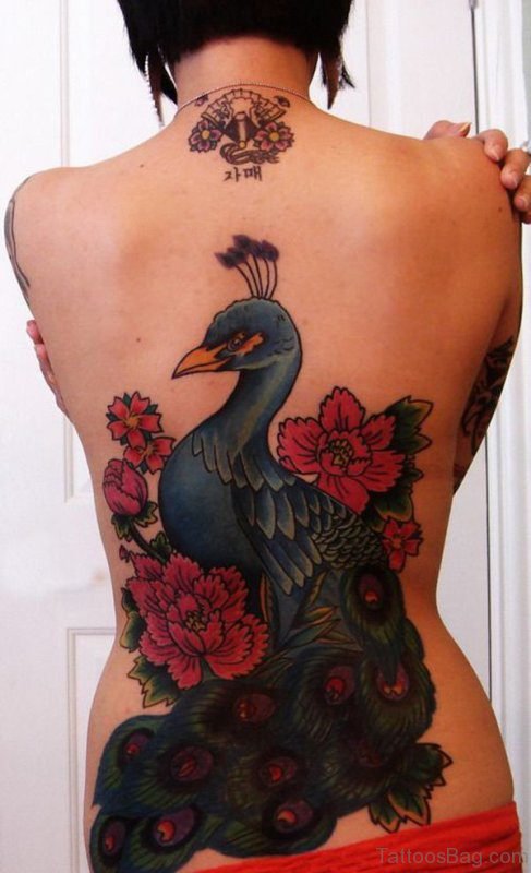 Dark Ink Peacock Tattoo On Back