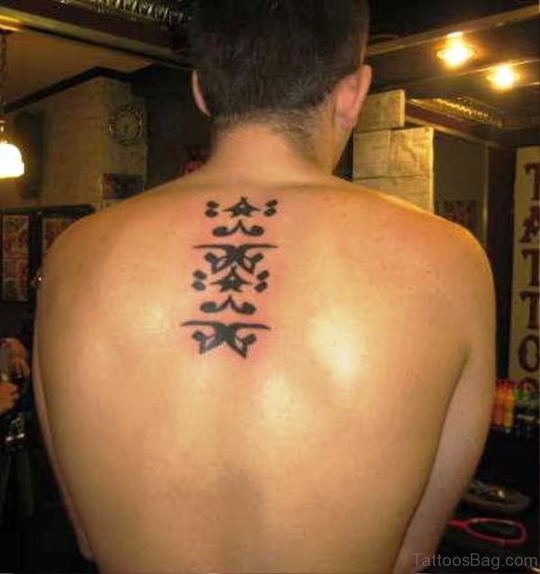 Dazzling Arabic Tattoo On Back