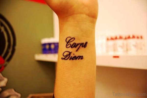 Delightful Carpe Diem Tattoo On Wrist