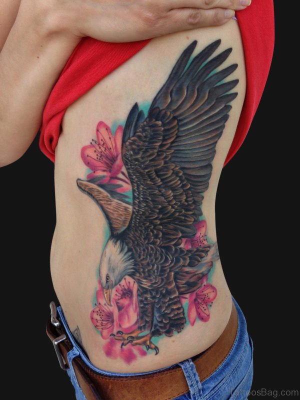 Eagle And Cherry Blossom Tattoo On Rib