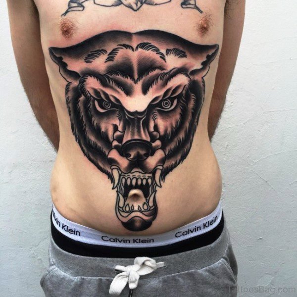 Elegant Alpha Wolf Tattoo On Stomach