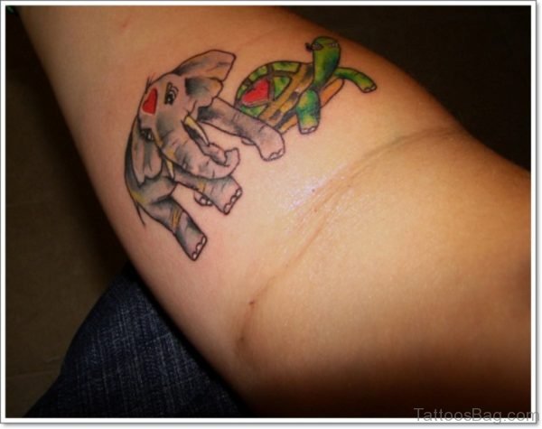 Elephant And Tortoise Tattoo On Forearm