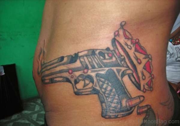 Fabulous Gun Tattoo On Waist
