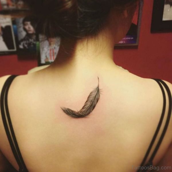 Feather Tattoo On Upper Back