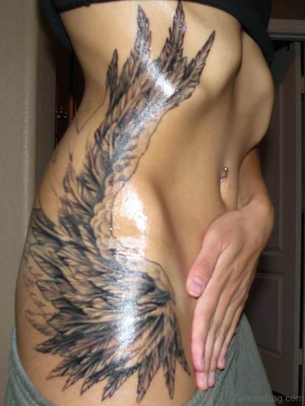 Female Wings Tattoo On Rib 