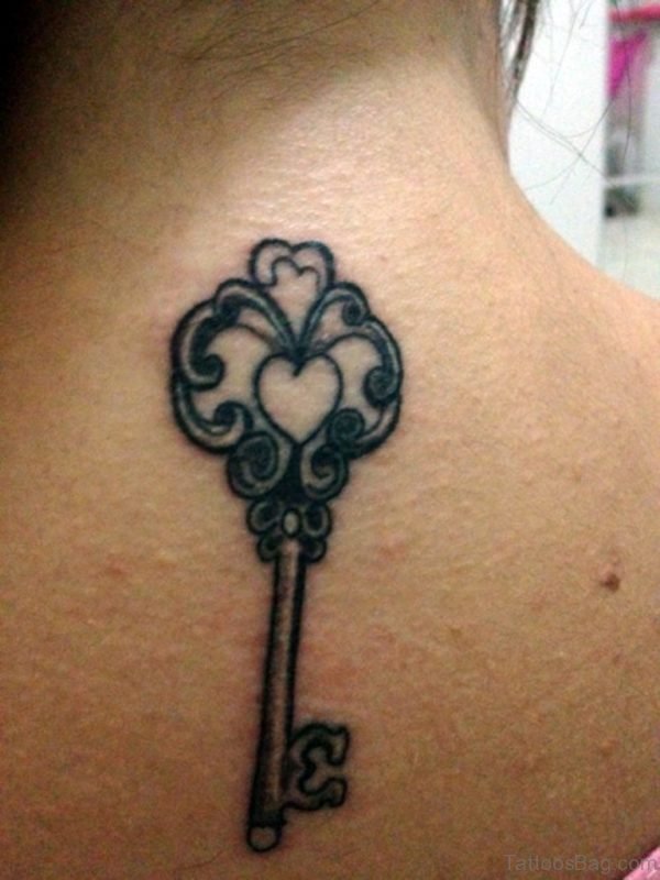 Feminine Key Tattoo On Back