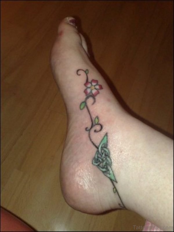 Flower And Knot Tattoo On Right Ankle
