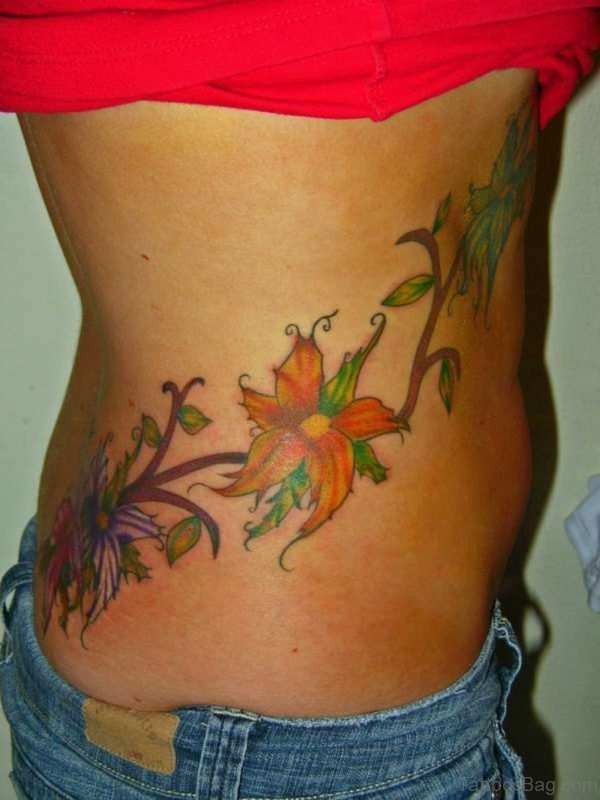 Flower Vines Tattoo design On Rib 