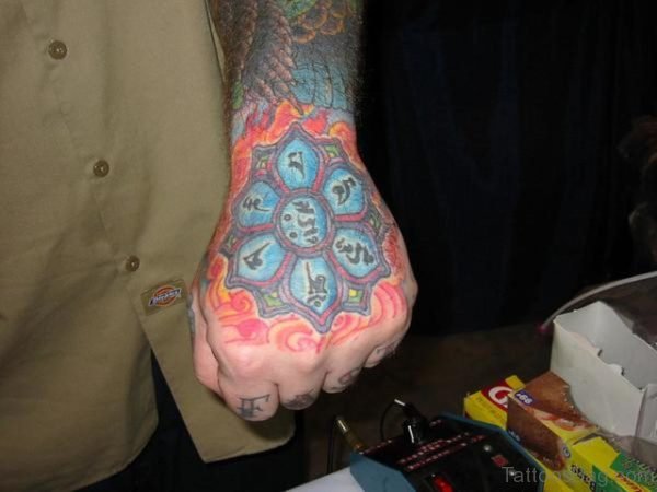 Flower With Symbols Hand Tattoo