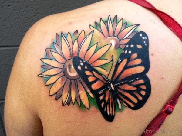 Flowers With Butterfly Tattoo On Shoulder