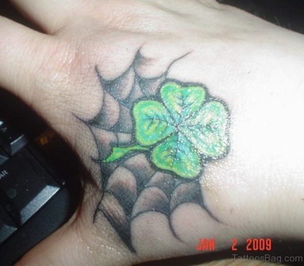 Four Leaf Clover Hand Tattoo