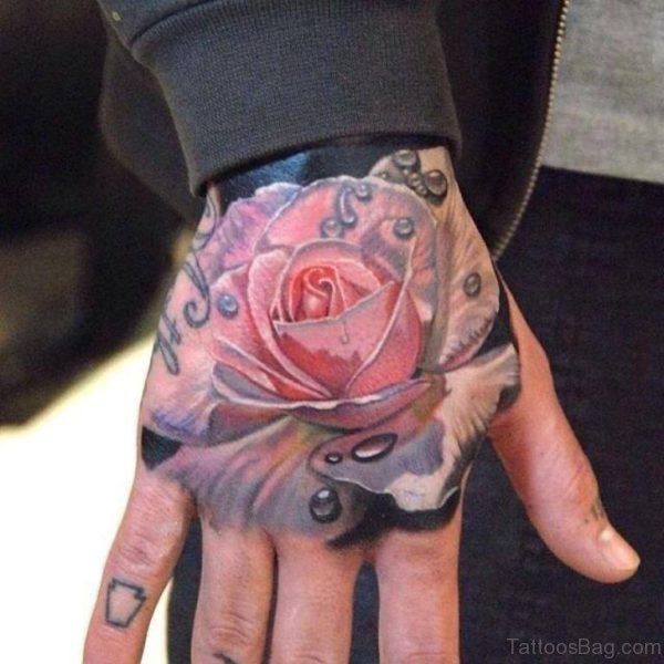 Gorgeous Pink Rose Tattoo On Hand