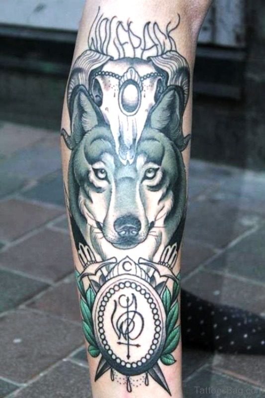 Green Aplha Wolf Tattoo On Arm