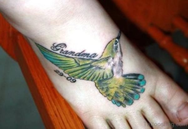 Green Bird Tattoo On Foot