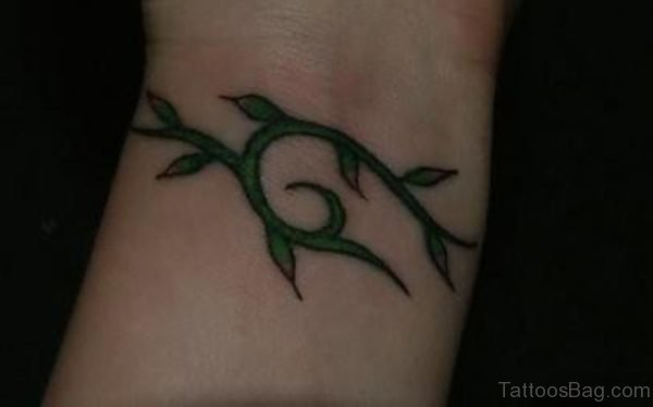 Green Leaves Tattoo On Wrist