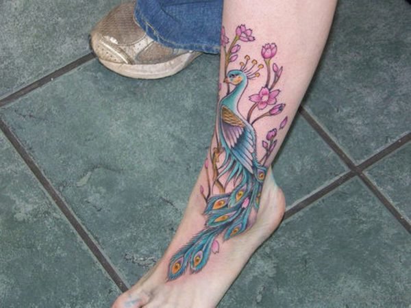 Green Peacock Tattoo On Foot