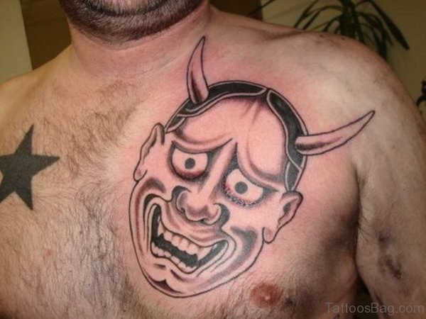 Grey Devil Mask Tattoo
