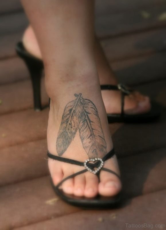 Grey Feather Tattoo