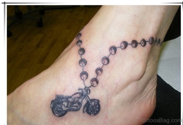 Grey Ink Bike Rosary Ankle Tattoo