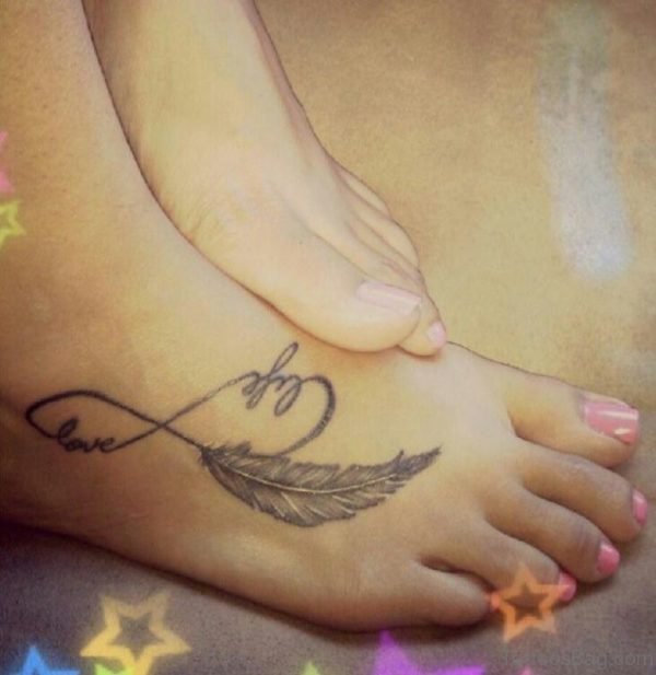 Grey Ink Feather And Infinity Tattoo On Right Foot
