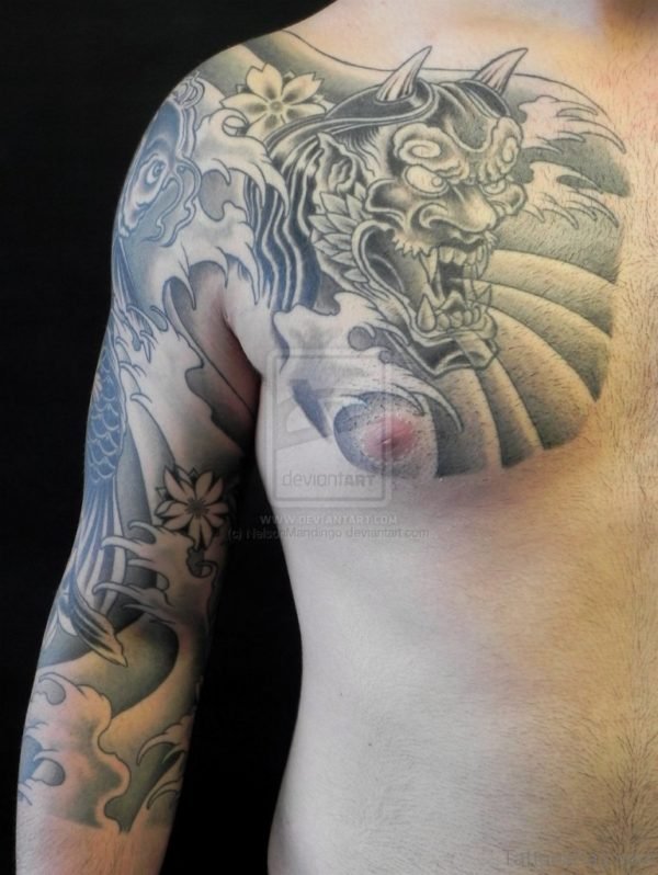 Grey Ink Oni Mask Tattoo On Chest