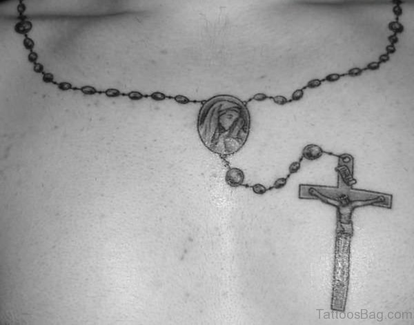 Grey Ink Rosary Tattoo On Chest