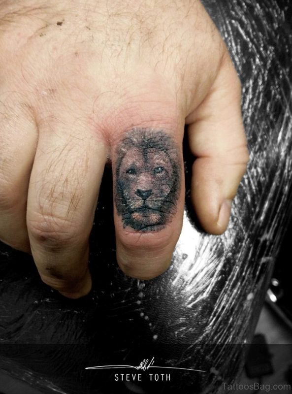 Grey Lion Finger Tattoo