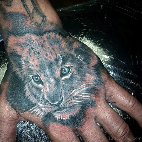 Grey Lion Tattoo On Hand