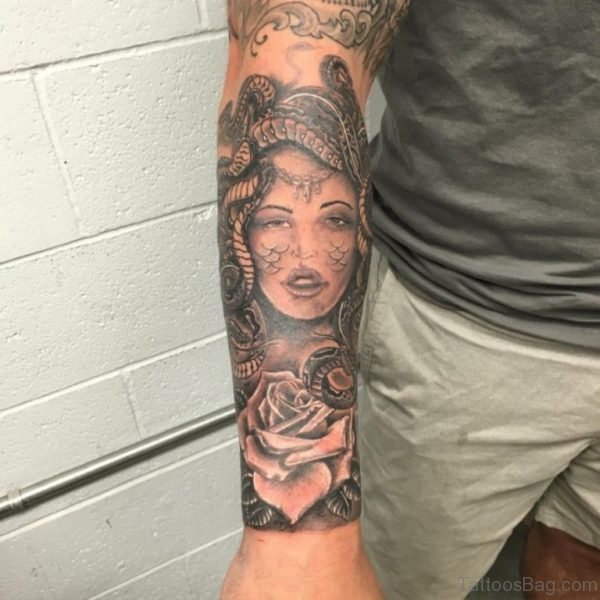 Grey Medusa Tattoo On Arm 