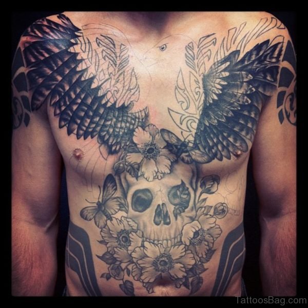 Grey Skull And Wings Tattoo On Chest 