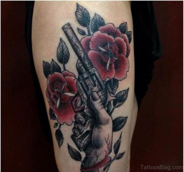 Gun And Flower Tattoo