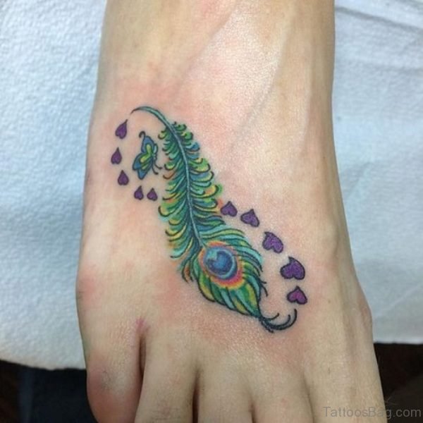 Heart And Peacock Feather Tattoo On Foot