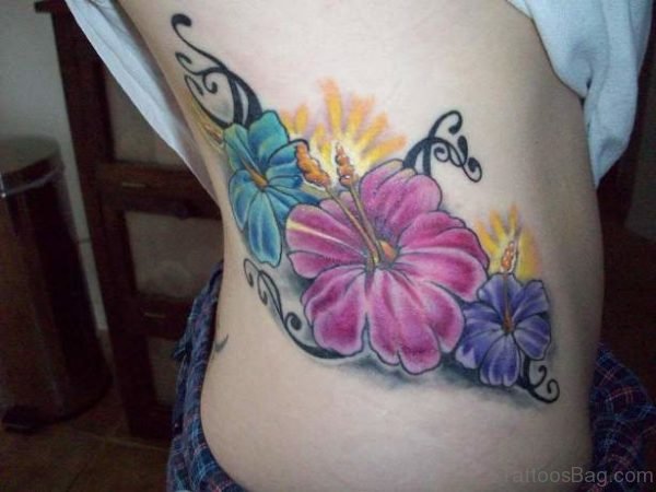 Hibiscus Flower Tattoo On Rib 